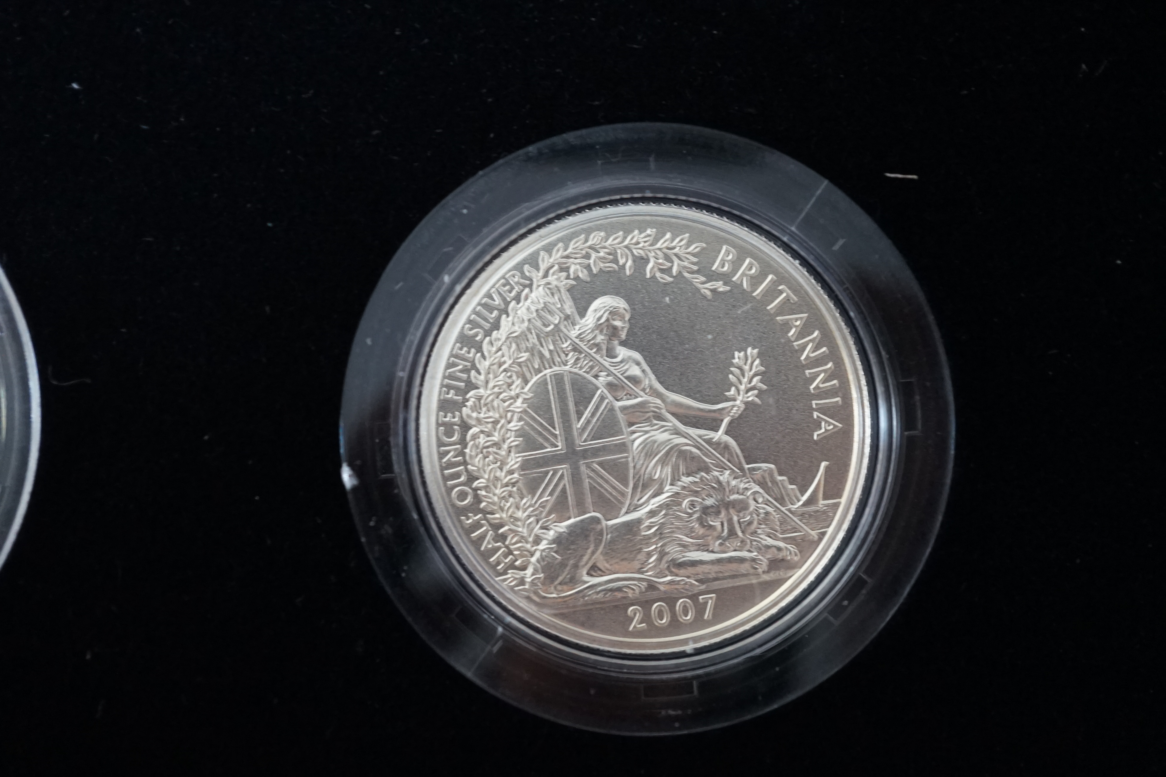 Elizabeth II proof coins, 2007 Britannia 20th Anniversary silver proof one pound collection, cased with certificate
